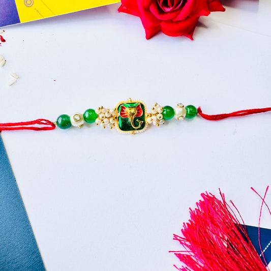 Ganpati Golden Cluster Rakhi